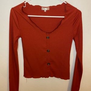 Dark orange button down top